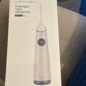 Portable Oral Irrigator